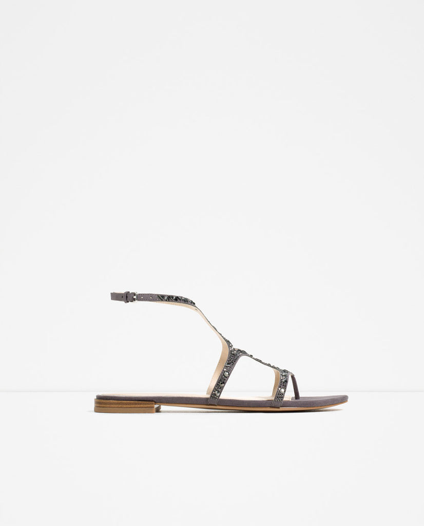 FLAT SANDALS WITH SHINY DETAILS