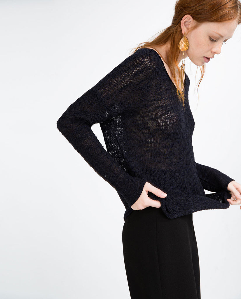 ASYMMETRIC HEM SWEATER