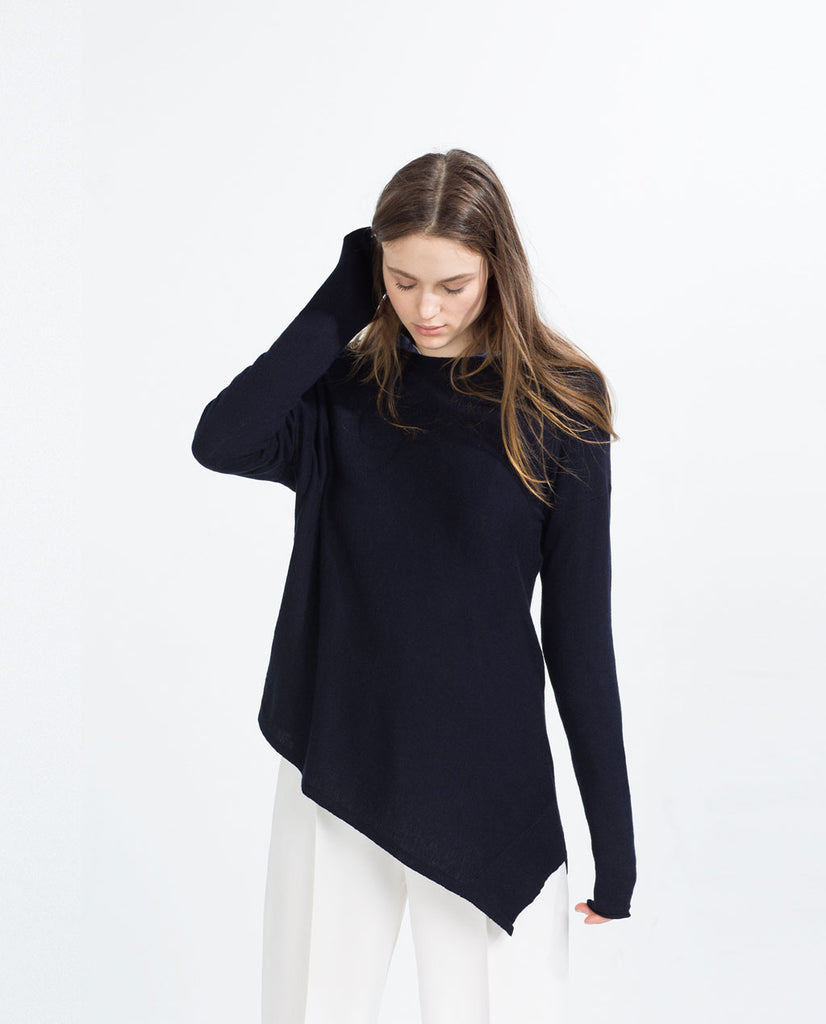 ASYMMETRIC HEM SWEATER