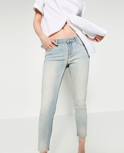 MID-RISE SKINNY JEANS