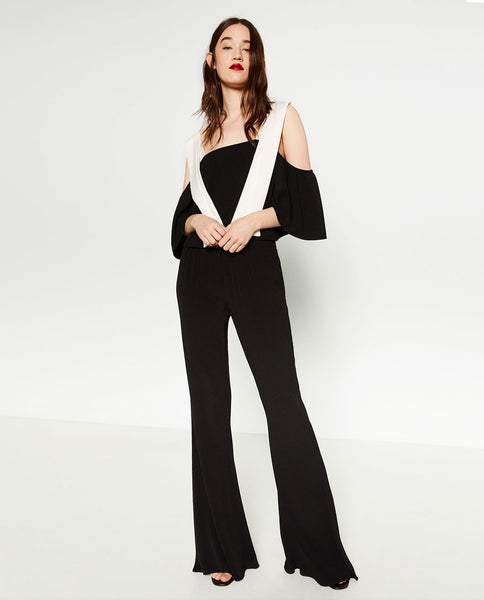 MID-RISE FLARED TROUSERS