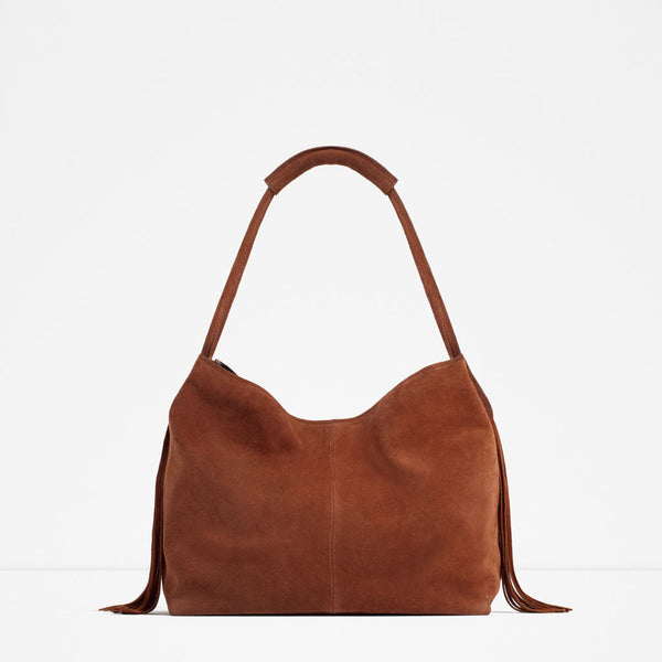 LEATHER BUCKET BAG WITH TASSELS