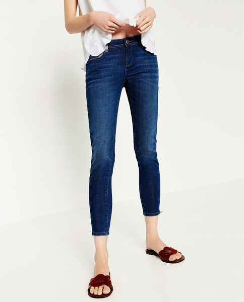 MID-RISE SKINNY JEANS